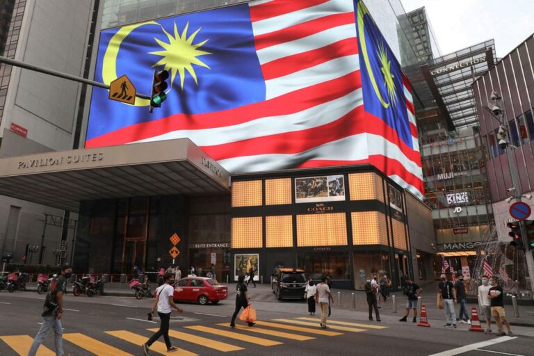 Malaysia imposes stricter rules, booster requirements over Omicron threat